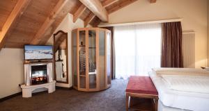 TV a/nebo společenská místnost v ubytování Hotel Gramaser