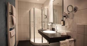 Koupelna v ubytování Hotel Gramaser