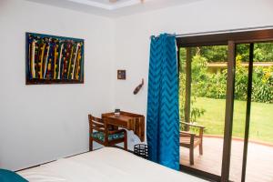 Rúm í herbergi á Hotel-Boutique Patampa