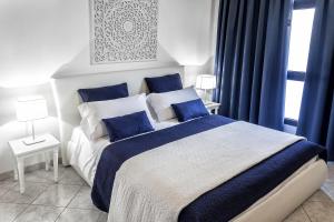 Postelja oz. postelje v sobi nastanitve Stella Marina 1