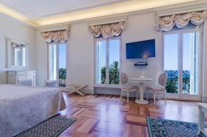 A television and/or entertainment centre at Hotel De Paris Sanremo