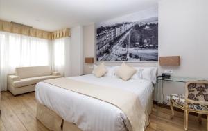 Rúm í herbergi á Suite Home Pinares