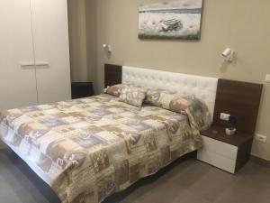 Postel nebo postele na pokoji v ubytování Lollo's Home
