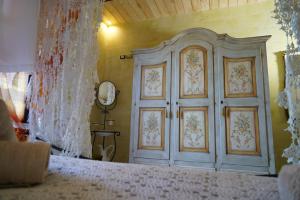 Postel nebo postele na pokoji v ubytování Masseria Le Terrazze di Serranova