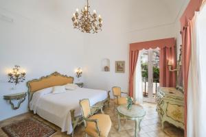 Posteľ alebo postele v izbe v ubytovaní villa virginia
