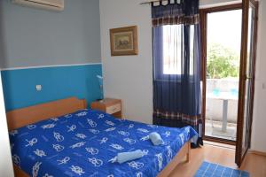 Postel nebo postele na pokoji v ubytování Apartments Lans