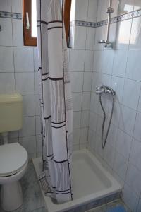 Koupelna v ubytování Apartments Lans
