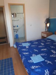 Postel nebo postele na pokoji v ubytování Apartments Lans