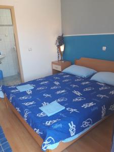 Postel nebo postele na pokoji v ubytování Apartments Lans