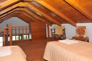 Кровать или кровати в номере Limanaki