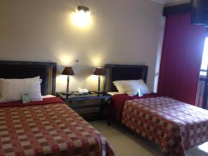 Katil atau katil-katil dalam bilik di Aspen Hotel & Apart