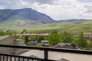 
a view from a balcony of a mountain range at Travelodge by Wyndham Gardiner Yellowstone Park North Entr in Gardiner
