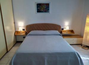 A bed or beds in a room at Casa Nax