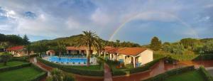 The swimming pool at or close to Lido Azzurro Residence rta