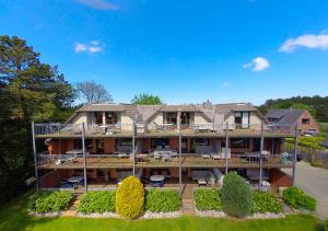 an aerial view of a large house at Appartementanlage Wieben in Sankt Peter-Ording