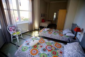 Postel nebo postele na pokoji v ubytování Casa Kilig