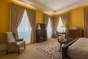 Rúm í herbergi á LHotel