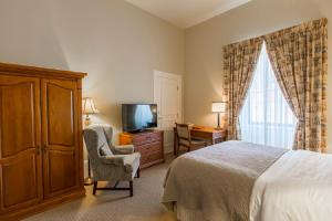 Rúm í herbergi á LHotel