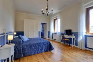 Postel nebo postele na pokoji v ubytování B&B La Contessa