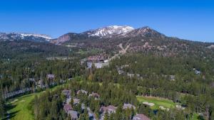 an aerial view of a resort in the mountains at Mammoth Golf Properties By 101 Great Escapes in Mammoth Lakes