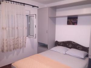 Voodi või voodid majutusasutuse Guesthouse Marko toas