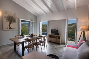 Χώρος καθιστικού στο Villas Amantea- four villas with big pool and infinity pool