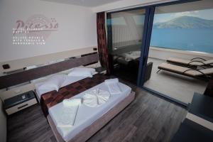 Postel nebo postele na pokoji v ubytování Hotel Picasso