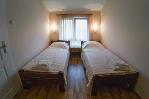 Ένα ή περισσότερα κρεβάτια σε δωμάτιο στο Apartmani "STEFANOVIĆ"