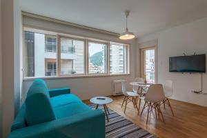 Et tv og/eller underholdning på Luxury Seaside Apartments