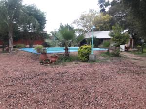 La pileta dentro o cerca de Hotel de Campo El Rebenque