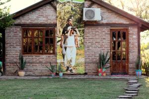 Un jardín fuera de Hotel de Campo El Rebenque