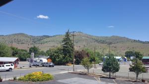 a view of a town with mountains in the background at Interstate 8 Motel in Lakeview