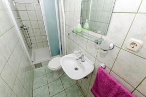 Koupelna v ubytování Apartments Dinko
