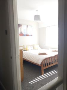 En eller flere senge i et værelse på Liverpool City House