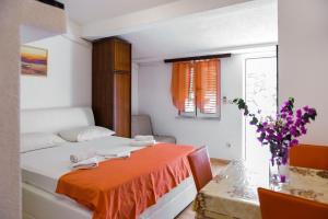 Säng eller sängar i ett rum på Apartment Herceg