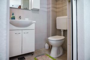 Kúpeľňa v ubytovaní Apartment Herceg