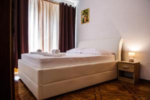 Posteľ alebo postele v izbe v ubytovaní Apartment Herceg