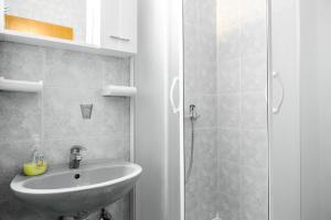 Kúpeľňa v ubytovaní Apartment Herceg