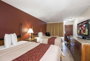 Extended Stay - Ormond Beach tesisinde bir odada yatak veya yataklar