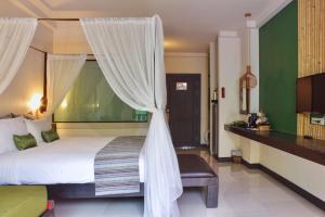 Postel nebo postele na pokoji v ubytování Bamboori Boutique Resort