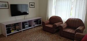 TV o dispositivi per l'intrattenimento presso Snow Leopard Lodge