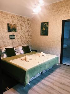 Postel nebo postele na pokoji v ubytování Altan Apartments