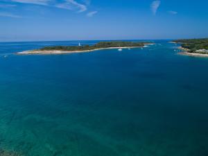 an aerial view of an island in the ocean at Mobile home - Kamp Olga in Banjole +3 photos