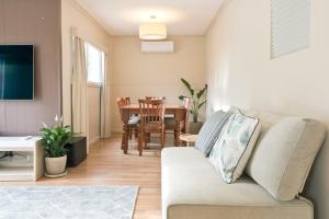 a living room with a couch and a table at 29 Jane in Tanunda