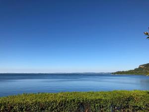a view of a large body of water at Appartamenti Villa Andrea in Garda