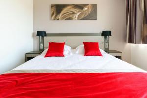 Postel nebo postele na pokoji v ubytování Hôtel AKENA Besançon