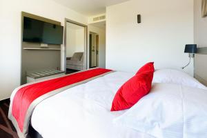 Postel nebo postele na pokoji v ubytování Hôtel AKENA Besançon