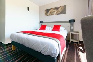 Postel nebo postele na pokoji v ubytování Hôtel AKENA Besançon