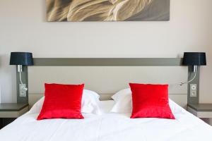 Postel nebo postele na pokoji v ubytování Hôtel AKENA Besançon