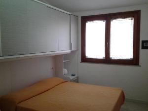Łóżko lub łóżka w pokoju w obiekcie Apartments Villas